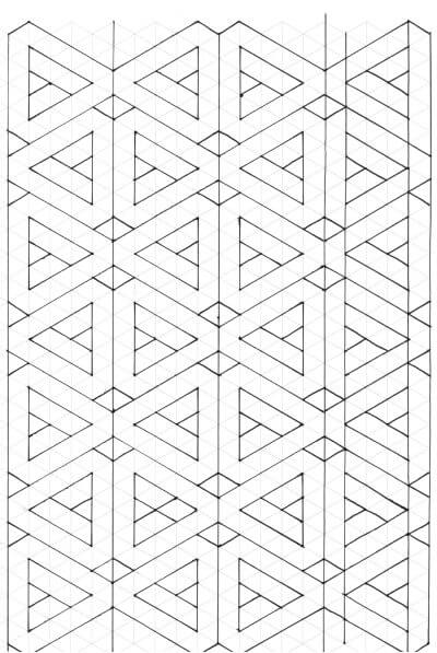 A designer sketching a complex rug pattern.