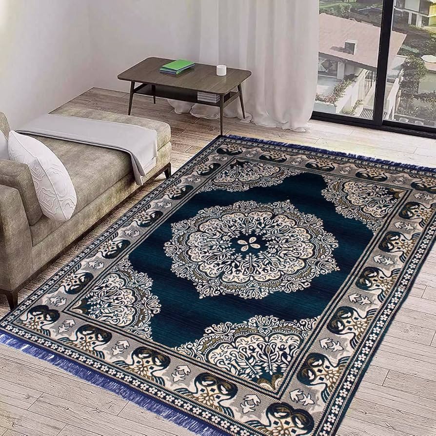A luxurious, deep blue velvet-like rug with a subtle sheen